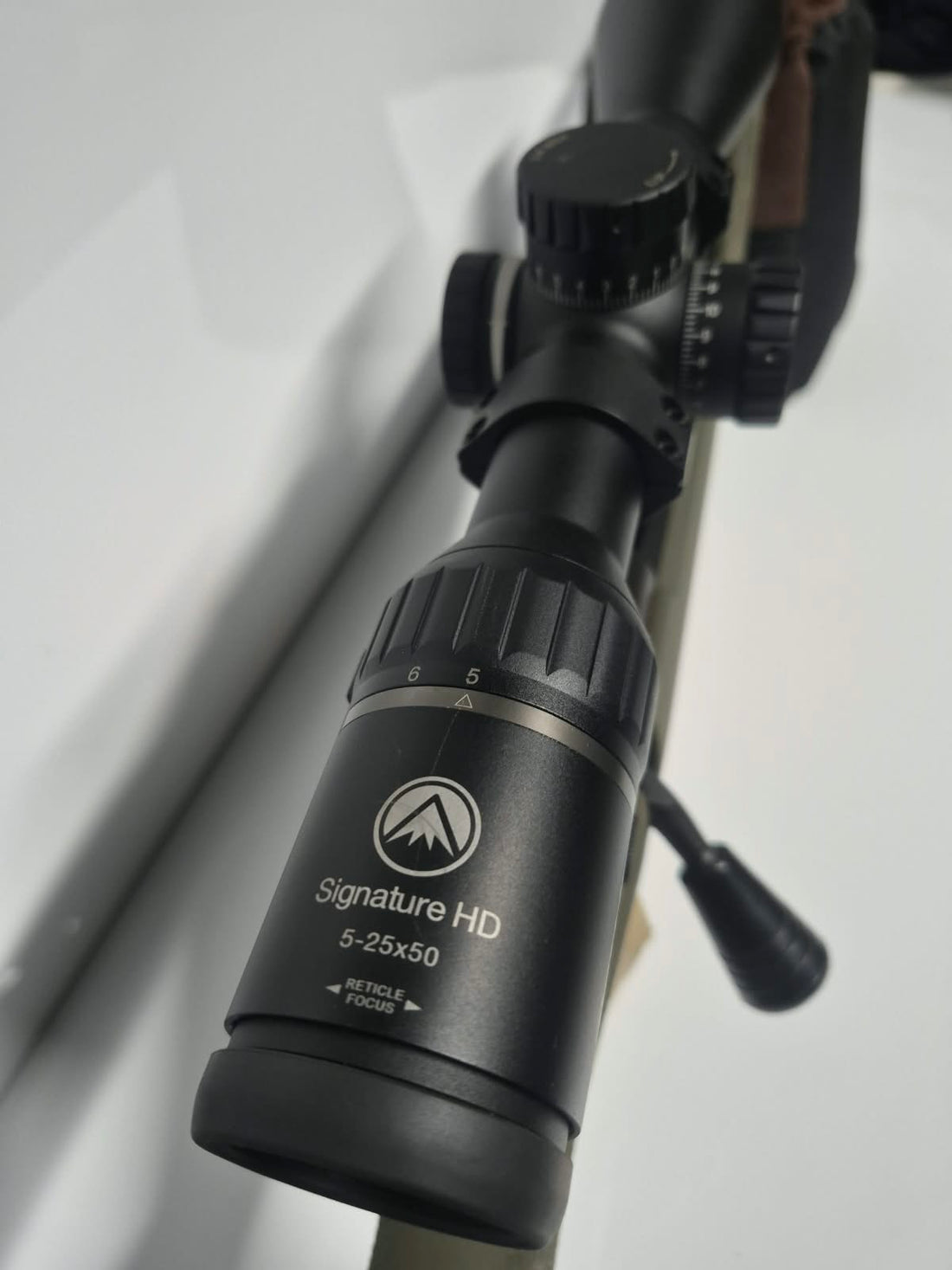 Howa 1500 6.5 Creedmoor Hogue (Green Stock) and Burris Signature 5-25x50 Scope Package